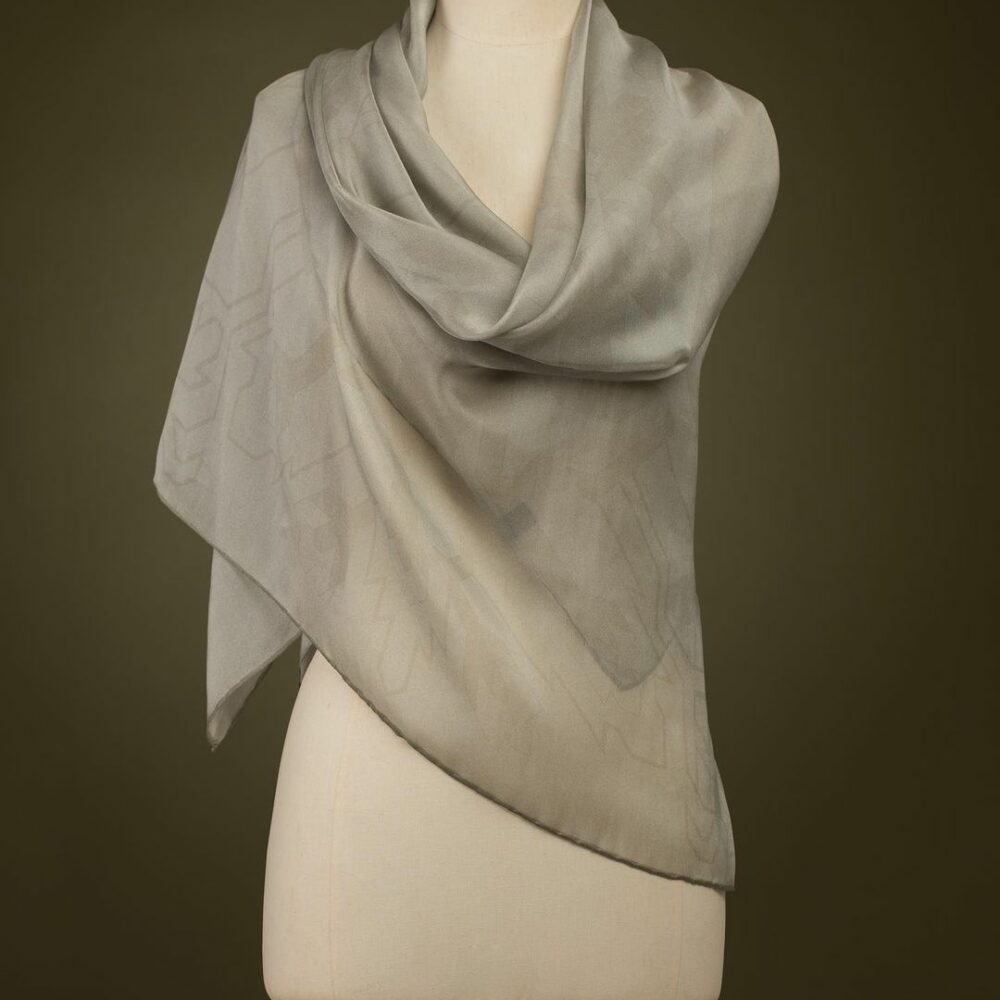 beige silk shawl on mannequin