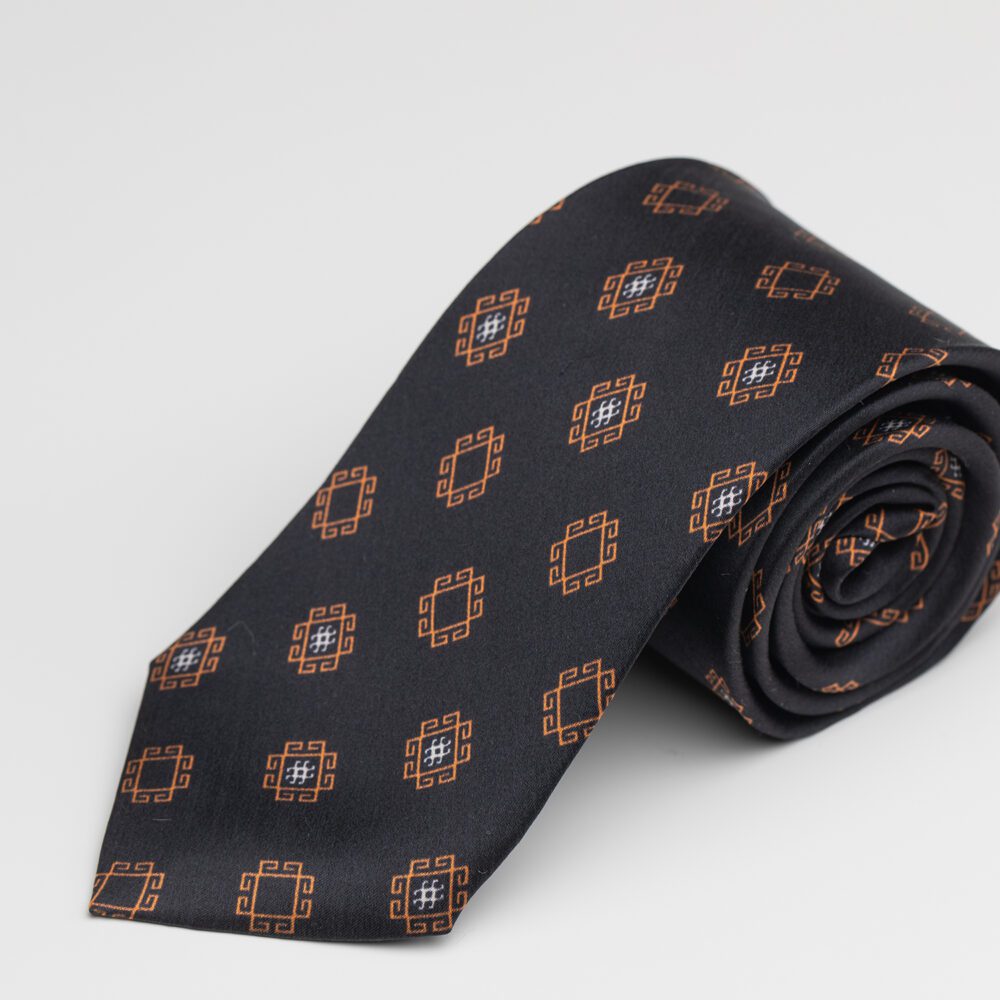 Black silk tie with copper geometric pattern inspired by Azerbaijani motifs